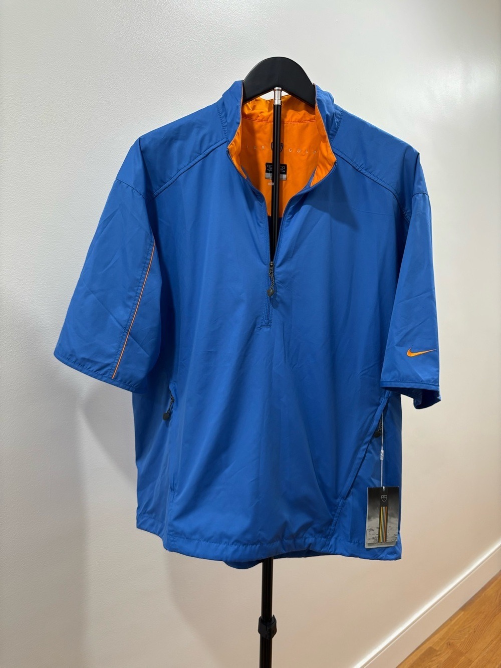 702. Nike Golf Men's Blue Short-Sleeve Jacket with Orange Lining. NWT!